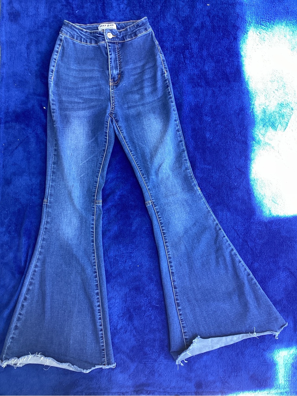 Wax Jean Indigo Flare Jeans with Frayed Hem